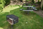 The community grill and picnic table is available for your use.